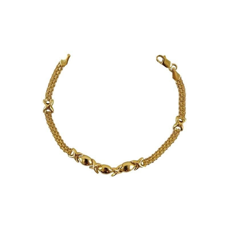 Pulsera de oro amarillo italiano semiesclava con diseños curvos