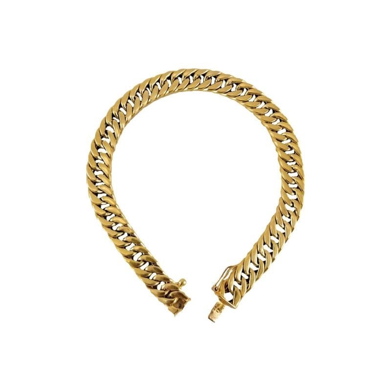 Pulsera de oro amarillo modelo grumé triple gruesa
