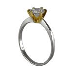 Solitario en oro blanco con engarce en oro amarillo y circón blanco