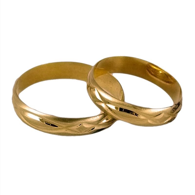 Par de alianzas de oro amarillo con detalles en el centro