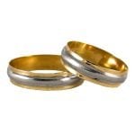 Par de alianzas de oro amarillo modelo piaget con centro en oro blanco