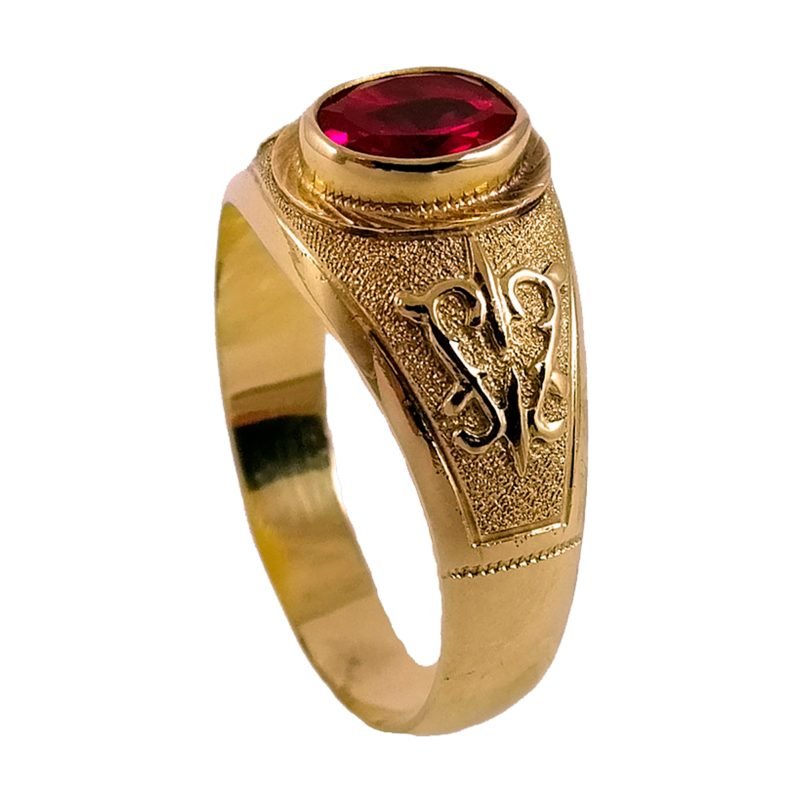 Carretón de oro amarillo nacional con piedra ovalada roja