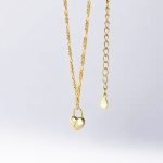 Cadena de plata italiana enchapada en oro modelo figaro con candado corazón