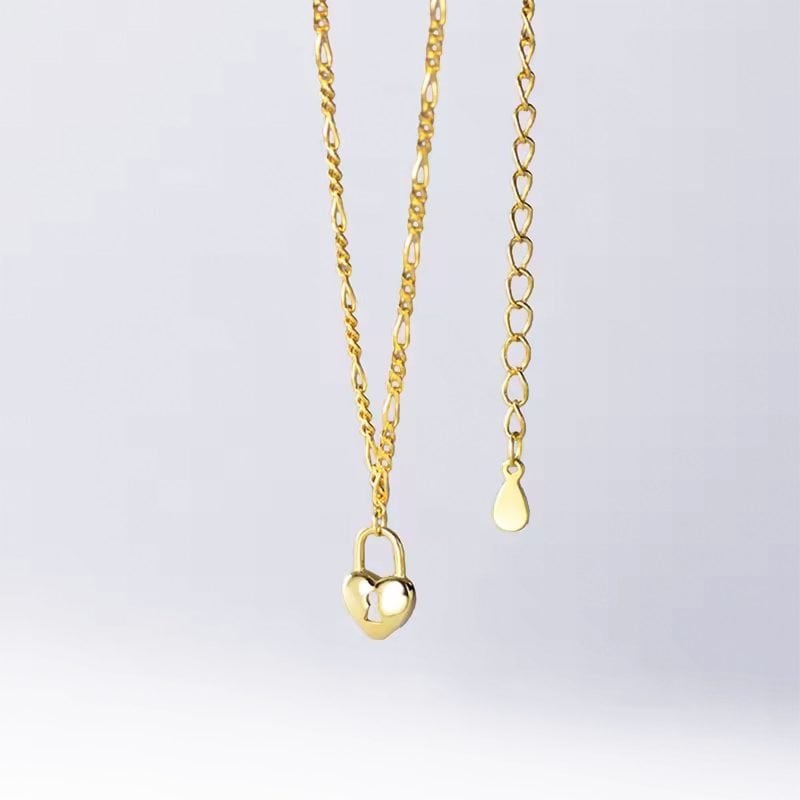 Cadena de plata italiana enchapada en oro modelo figaro con candado corazón