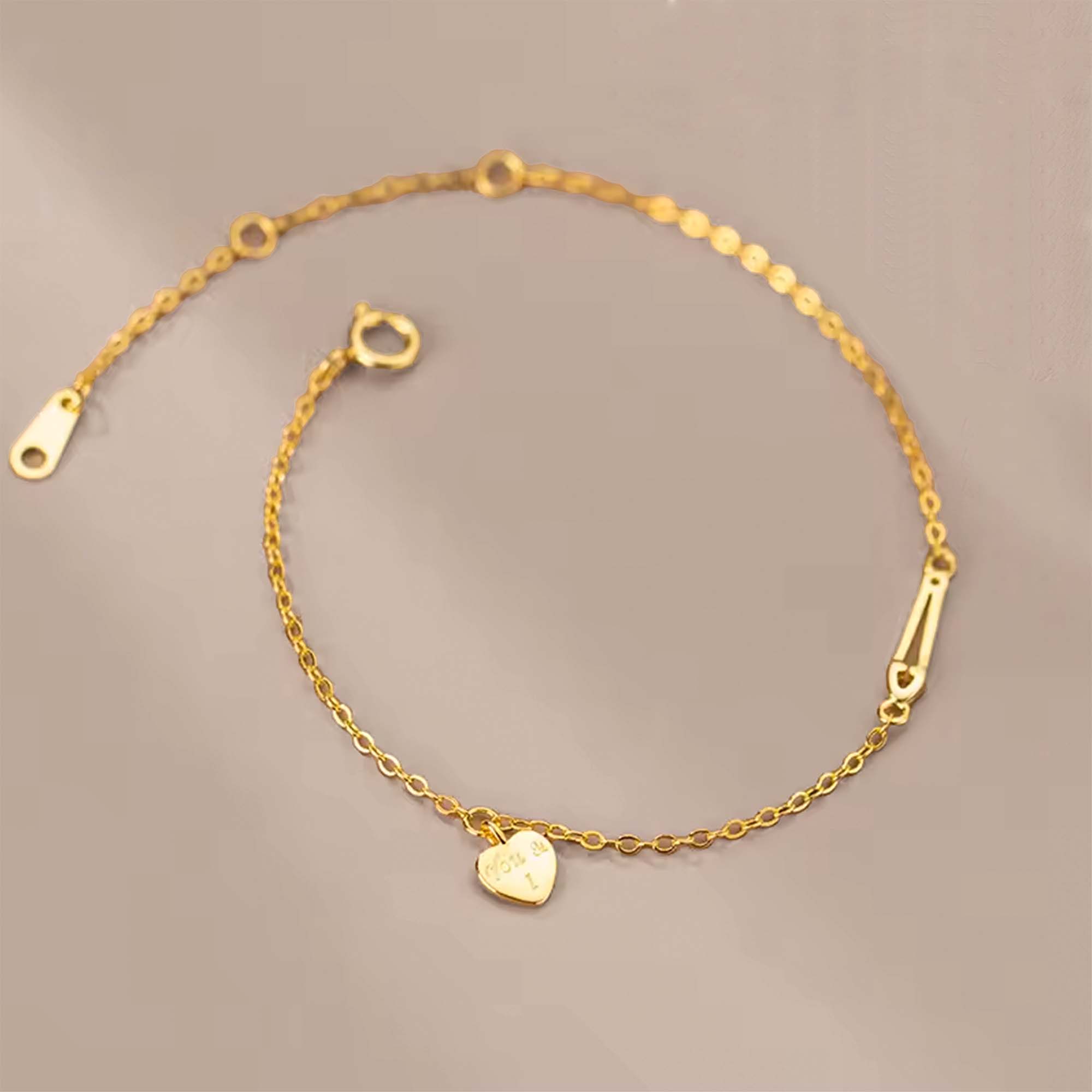 Pulsera de plata italiana con enchapado en oro y dije de corazon con flecha