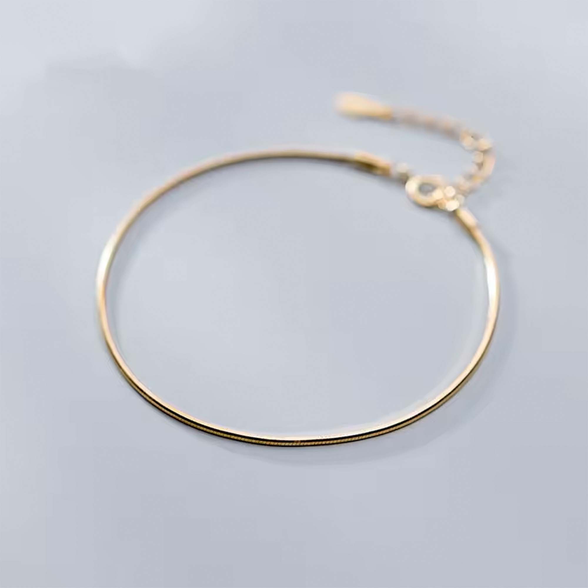 Pulsera de plata italiana con enchapado en oro modelo cola de rata