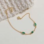 Pulsera de plata italiana con enchapado en oro y circones verdes ovalados