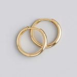 Aros argollas redondas de plata con enchapado en oro modelo media caña