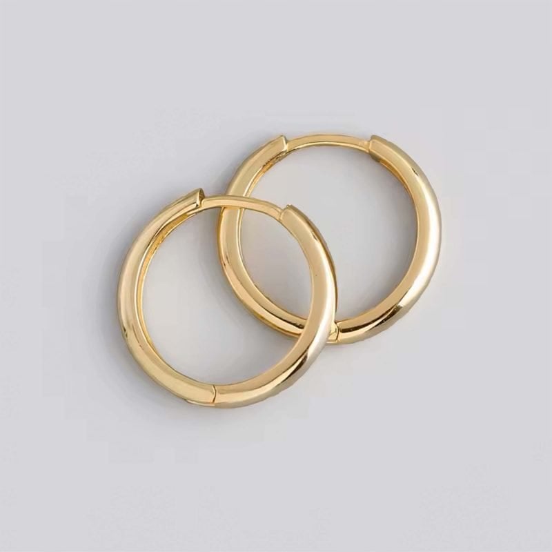 Aros argollas redondas de plata con enchapado en oro modelo media caña