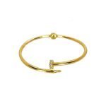 Esclava de oro amarillo italiano con forma de tornillos con circones blancos