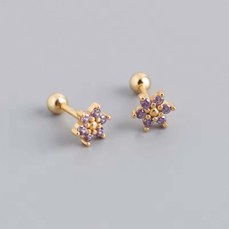 Aros a rosca de plata con enchapado en oro modelo flor con circones