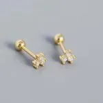 Aros a rosca de plata con enchapado en oro modelo flor con circones de tres pétalos