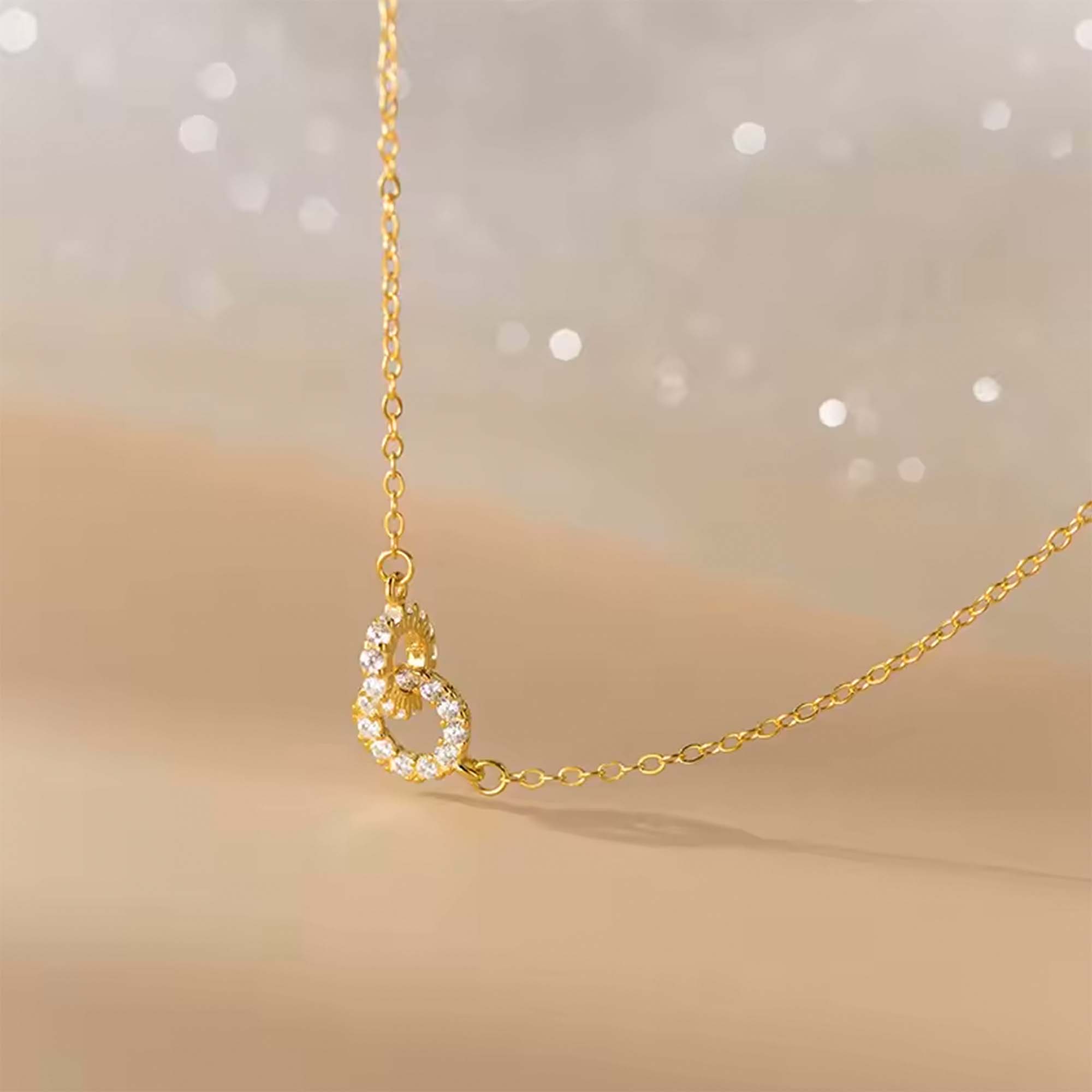 Cadena de Plata con enchapado en oro con anillos enlazados y circones